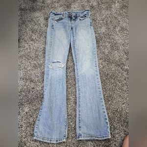 Distressed Low Rise Bootcut Jeans